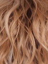 PEACHES AND CREAM | A vibrant peach blonde with creamy undertones and bright, face-framing cream highlights. Rich chocolate root adds depth.


