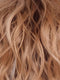 PEACHES AND CREAM | A vibrant Peach Blonde with creamy undertones and bright, face-framing cream highlights. Rich Chocolate root adds depth.