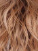 PEACHES AND CREAM | A vibrant peach blonde with creamy undertones and bright, face-framing cream highlights. Rich chocolate root adds depth.


