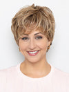 Model is wearing MISTY by HENRY MARGU in color 8/27/26GR | Medium Brown with Strawberry and Golden Blonde Highlights, Shaded with Medium Dark Brown Roots