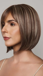 Model is wearing AMI by NORIKO in color SNOWY UMBER R | Medium Ginger Brown base with White Blond highlights
