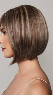 Model is wearing AMI by NORIKO in color SNOWY UMBER R | Medium Ginger Brown base with White Blond highlights
