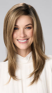 Model is wearing BELINDA HAND TIED by ENVY in color HONEY BREEZE | A blend of Cool, Honey Blonde and Multi-Dimensional Medium Brown with Darker Brown Roots