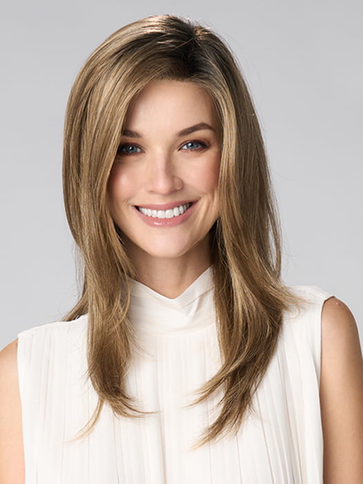 Model is wearing BELINDA HAND TIED by ENVY in color HONEY BREEZE | A blend of Cool, Honey Blonde and Multi-Dimensional Medium Brown with Darker Brown Roots