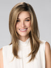 Model is wearing BELINDA HAND TIED by ENVY in color HONEY BREEZE | A blend of Cool, Honey Blonde and Multi-Dimensional Medium Brown with Darker Brown Roots