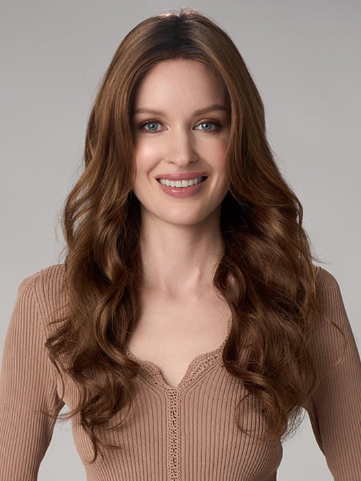Model is wearing BRIANNA HAND TIED by ENVY in color CINNAMON TOFFEE | Neutral to Warm Light Brown with Dark Brown Roots
