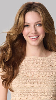Model is wearing BRIANNA HAND TIED by ENVY in color GOLDEN NUTMEG | Medium Brown roots with overall Warm Cinnamon base and Golden Blonde Highlights