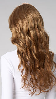 Model is wearing BRIANNA HAND TIED by ENVY in color GOLDEN NUTMEG | Medium Brown roots with overall Warm Cinnamon base and Golden Blonde Highlights