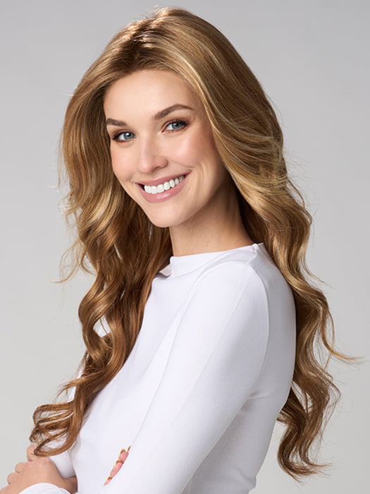 Model is wearing BRIANNA HAND TIED by ENVY in color GOLDEN NUTMEG | Medium Brown roots with overall Warm Cinnamon base and Golden Blonde Highlights
