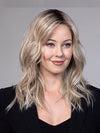 Model is wearing CAMPBELL by BELLETRESS in color BUTTERBEER R | Dark Brown Base and Root that transitions smoothly into a buttery blonde, infused with creamy honey and toffee tones