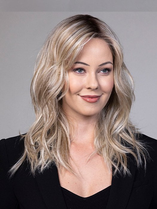 Model is wearing CAMPBELL by BELLETRESS in color BUTTERBEER R | Dark Brown Base and Root that transitions smoothly into a buttery blonde, infused with creamy honey and toffee tones