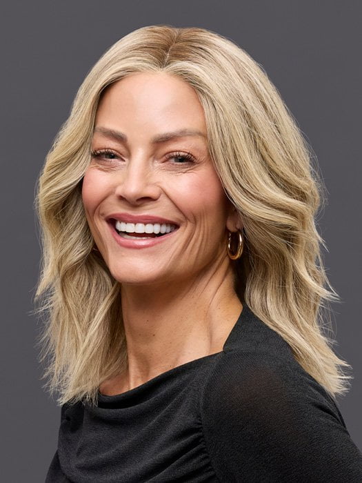 Model is wearing CARRIE LARGE by JON RENAU in color 24BT18S8 SHADED MOCHA | Medium Natural Ash Blonde & Light Natural Gold Blonde Blend, Shaded with Medium Brown