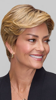 Model is wearing CELINE by JON RENAU in color 24BT18S8 SHADED MOCHA | Medium Natural Ash Blonde & Light Natural Gold Blonde Blend, Shaded with Medium Brown