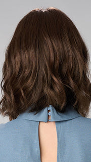 Model is wearing CHARLOTTE HAND TIED by ENVY in color MEDIUM BROWN | Medium Brown with natural highlights
