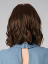 Model is wearing CHARLOTTE HAND TIED by ENVY in color MEDIUM BROWN | Medium Brown with natural highlights