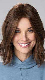 Model is wearing CHARLOTTE HAND TIED by ENVY in color MEDIUM BROWN | Medium Brown with natural highlights