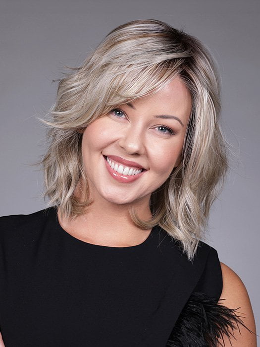 Model is wearing DONNA by BELLETRESS in color BUTTERBEER R | Dark Brown Base and Root that transitions smoothly into a buttery blonde, infused with creamy honey and toffee tones