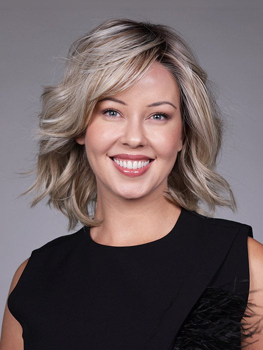 Model is wearing DONNA by BELLETRESS in color BUTTERBEER R | Dark Brown Base and Root that transitions smoothly into a buttery blonde, infused with creamy honey and toffee tones
