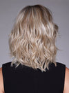 Model is wearing DONNA by BELLETRESS in color BUTTERBEER R | Dark Brown Base and Root that transitions smoothly into a buttery blonde, infused with creamy honey and toffee tones