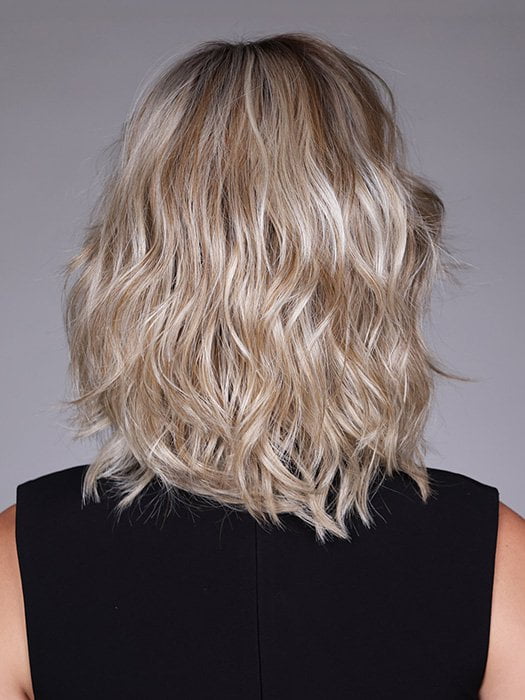 Model is wearing DONNA by BELLETRESS in color BUTTERBEER R | Dark Brown Base and Root that transitions smoothly into a buttery blonde, infused with creamy honey and toffee tones