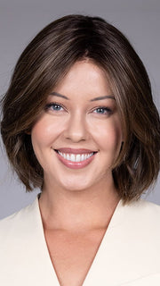 Model is wearing DUBLIN by BELLETRESS in color COOLEST ASH BROWN R | A combination of Light Ash Brown, Cool Medium Brown and a hint of Dark Blonde and Dark Roots