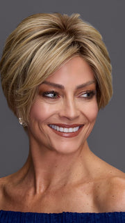 Model is wearing DEMI by JON RENAU in color 12FS8 SHADED PRALINE | Medium Natural Gold Blonde, Light Gold Blonde, Pale Natural Blonde Blend, Shaded with Dark Brown