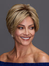 Model is wearing DEMI by JON RENAU in color 12FS8 SHADED PRALINE | Medium Natural Gold Blonde, Light Gold Blonde, Pale Natural Blonde Blend, Shaded with Dark Brown