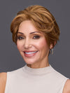 Model is wearing DEMI by JON RENAU in color 6F27 CARAMEL RIBBON | Brown with Light Red-Gold Blonde Highlights & Tips