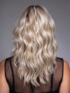 Model is wearing EVERDEEN by BELLETRESS in color BUTTERBEER R | Dark Brown Base and Root that transitions smoothly into a buttery blonde, infused with creamy honey and toffee tones