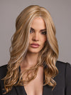 Model is wearing ESME by RENE OF PARIS in color GOLDEN LATTE BLOND | Non‑rooted shade featuring a Warm Golden Blonde base enriched with a balanced mix of Cream, White, and Golden Blonde highlights