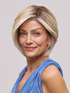 Model is wearing EVE by JON RENAU in color 101/88/27S8 CATALINA BLONDE | Pale blonde with Pure White Natural Violet halo highlights, shaded medium brown