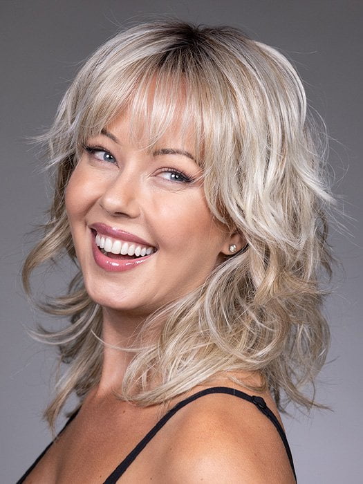 Model is wearing FARRAH by BELLETRESS in color BUTTERBEER R | Dark Brown Base and Root that transitions smoothly into a buttery blonde, infused with creamy honey and toffee tones