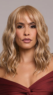 Model is wearing FRANKY by RENE OF PARIS in color GOLDEN LATTE BLOND | Non‑rooted shade featuring a Warm Golden Blonde base enriched with a balanced mix of Cream, White, and Golden Blonde highlights