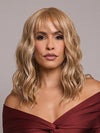 Model is wearing FRANKY by RENE OF PARIS in color GOLDEN LATTE BLOND | Non‑rooted shade featuring a Warm Golden Blonde base enriched with a balanced mix of Cream, White, and Golden Blonde highlights