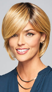 Model is wearing ENLIGHTEN by GABOR in color SS-MEDIUM-BLONDE | Medium Blonde with Warm Highlights & Dark Brown Roots