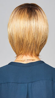 Model is wearing ENLIGHTEN by GABOR in color SS-MEDIUM-BLONDE | Medium Blonde with Warm Highlights & Dark Brown Roots