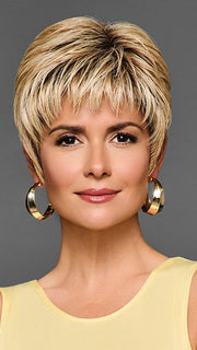 Model is wearing BOSS ENERGY by GABOR in color GF14-88SS GOLDEN WHEAT | Dark Blonde evenly Blended with Pale Blonde Highlights and Dark Roots