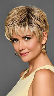 Model is wearing BOSS ENERGY by GABOR in color GF14-88SS GOLDEN WHEAT | Dark Blonde evenly Blended with Pale Blonde Highlights and Dark Roots
