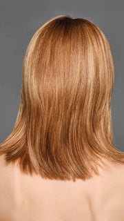 Model is wearing SERVING LOOKS by GABOR in color GF29-33SS ICED PUMPKIN SPICE | Strawberry Blonde shaded with Dark Red-Brown