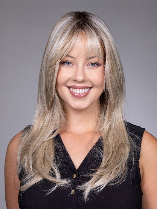 Model is wearing GIGI by BELLETRESS in color BUTTERBEER R | Dark Brown Base and Root that transitions smoothly into a buttery blonde, infused with creamy honey and toffee tones
