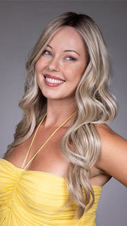 Model is wearing GISELE by BELLETRESS in color BUTTERBEER R | Dark Brown Base and Root that transitions smoothly into a buttery blonde, infused with creamy honey and toffee tones