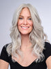 Model is wearing 16" AU NATUREL WAVES TOPPER by HAIRDO in color R56/60 SILVER MIST | Lightest Gray with 20% Medium Brown Evenly Blended with Pure White