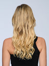 Model is wearing 18" VOLUME EXTENSION by HAIRDO in color SS14/88H SHADED GOLDEN WHEAT | Dark Blonde Evenly Blended with Pale Blonde Highlights and Dark Roots
