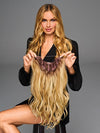 Model is wearing 19IN WAVY INVISIBLE EXTENSION by HAIRDO in color SS14/88H SHADED GOLDEN WHEAT | Dark Blonde Evenly Blended with Pale Blonde Highlights and Dark Roots
