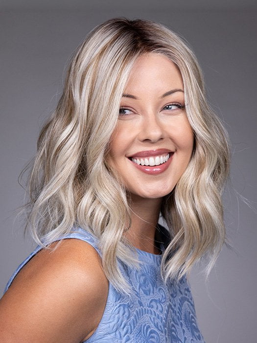 Model is wearing KARLIE by BELLETRESS in color BUTTERBEER R | Dark Brown Base and Root that transitions smoothly into a buttery blonde, infused with creamy honey and toffee tones