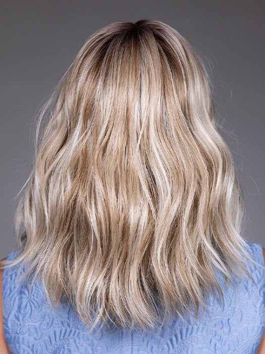 Model is wearing KARLIE by BELLETRESS in color BUTTERBEER R | Dark Brown Base and Root that transitions smoothly into a buttery blonde, infused with creamy honey and toffee tones