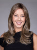 Model is wearing MARSEILLE by BELLETRESS in color MACADAMIA LATTE R | A combination of Medium and Light Brown, highlighted with Light Gold Blonde, and a mixture of Ash Blonde and Light Gold Blonde, Rooted with Medium and Light Brown