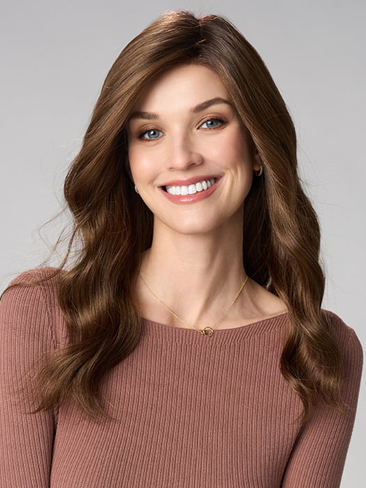 Model is wearing MAYA HAND TIED by ENVY in color MACCHIATO | A blend of Chestnut Brown and Soft Dark Blonde with Dark Brown Roots