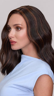 Model is wearing MORGAN by JON RENAU in color FS4/33/30A MIDNIGHT COCOA | Dark Brown, Medium Red, Medium Natural Red Blonde/Brown Blend with Medium Natural Red Blonde/Brown Blend Bold Highlights