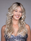 Model is wearing OLYMPIA by BELLETRESS in color BUTTERBEER R | Dark Brown Base and Root that transitions smoothly into a buttery blonde, infused with creamy honey and toffee tones